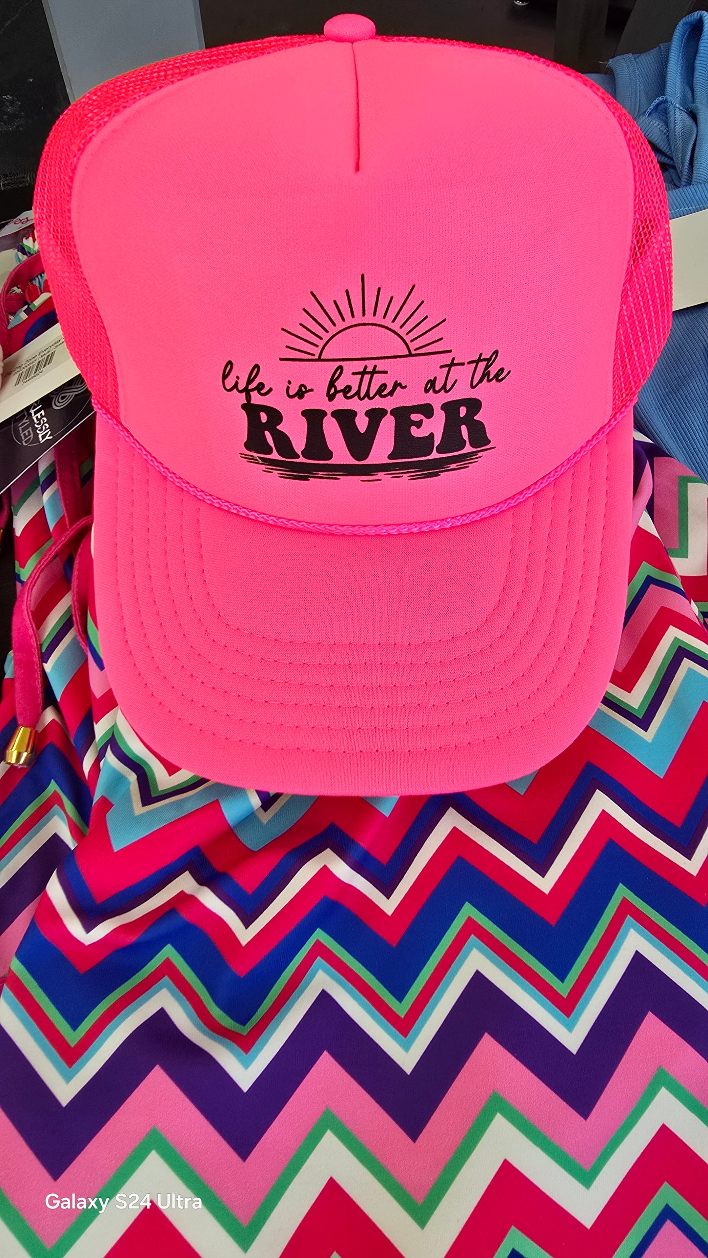Life is better at the river trucker hat