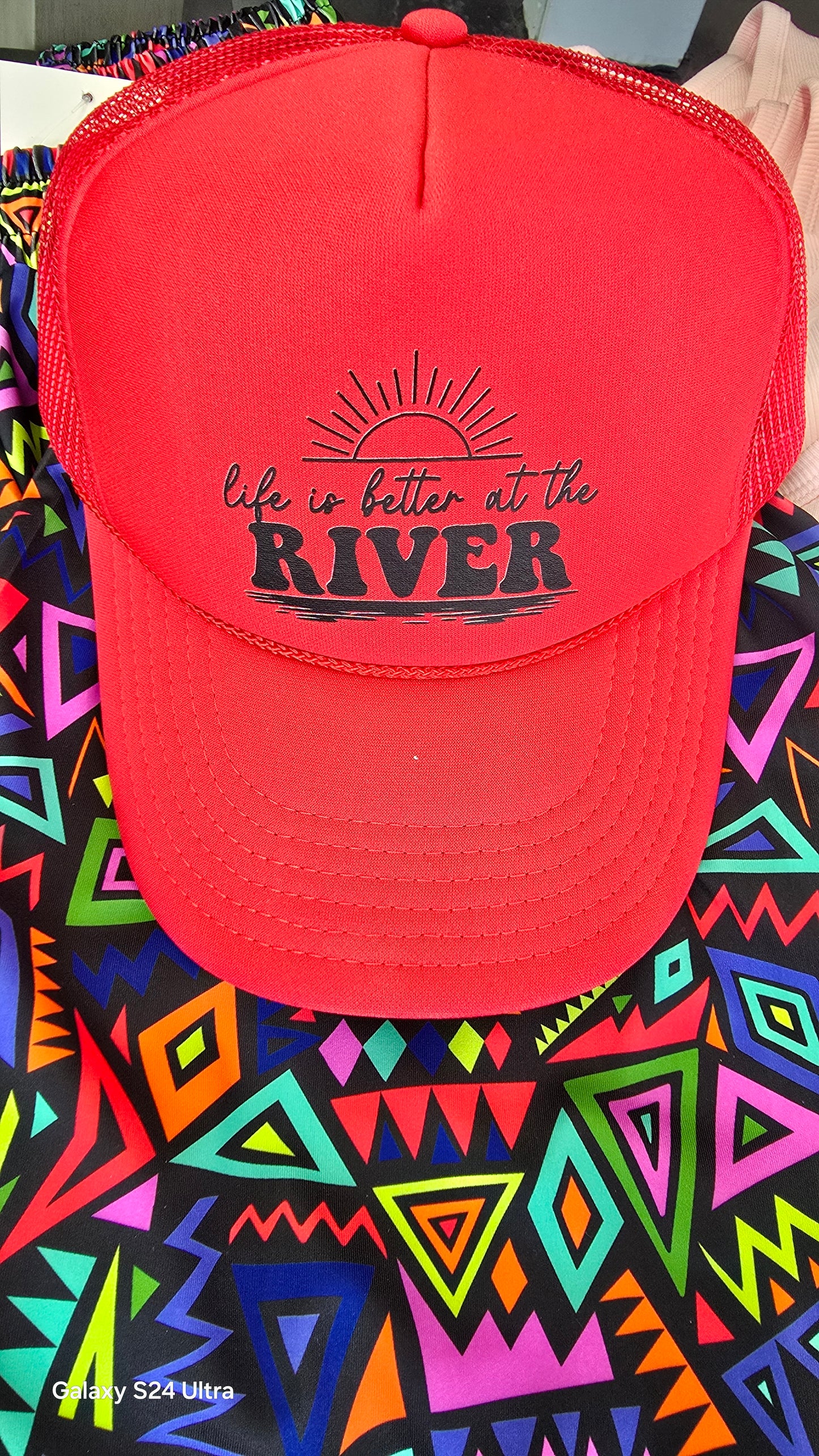 Life is better at the river trucker hat