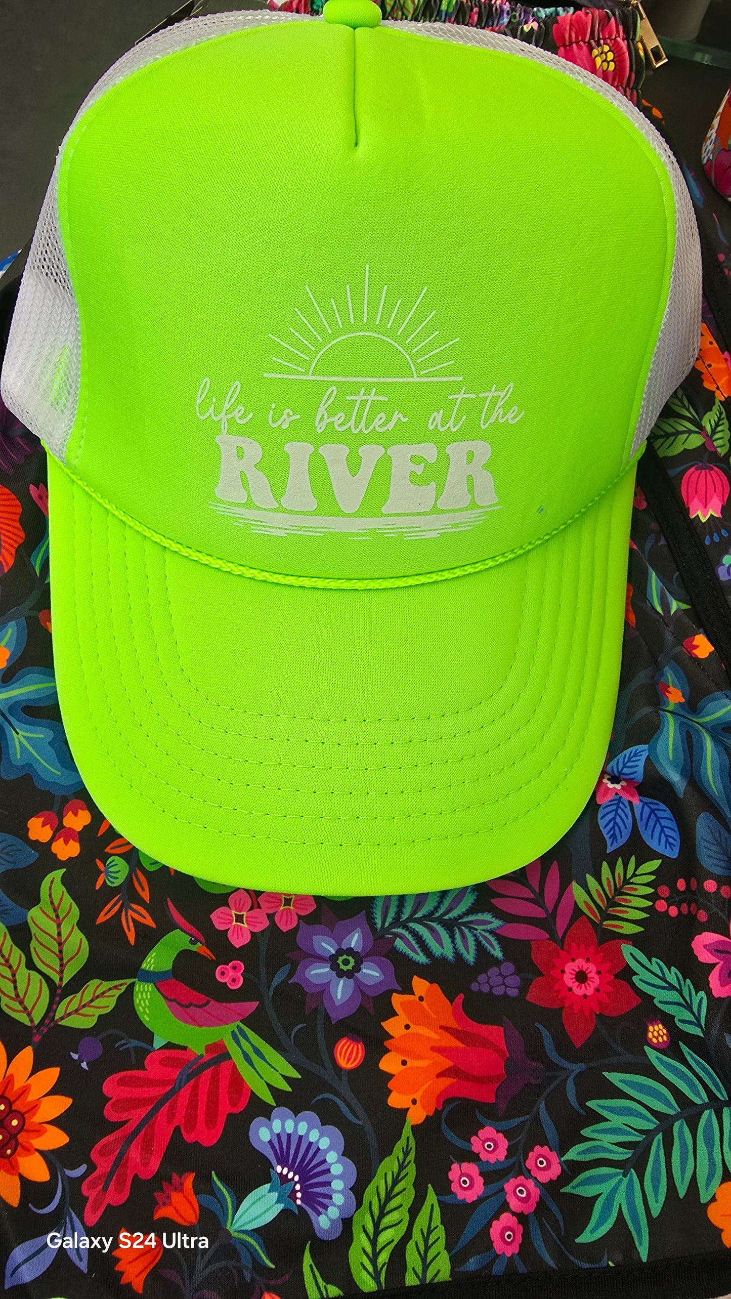 Life is better at the river trucker hat