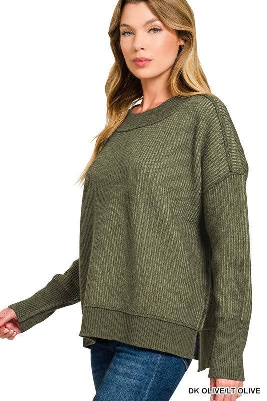 Relaxed fit knit sweater with raw seams – side slit detail in olive